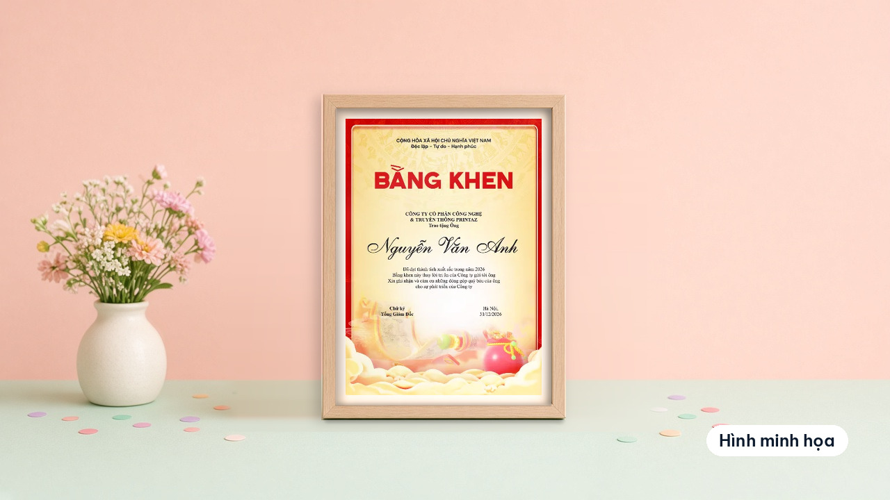 A4 portrait certificate of merit with a red border and golden clouds in a wooden frame on a mint table